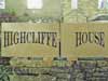 Carved stone house sign